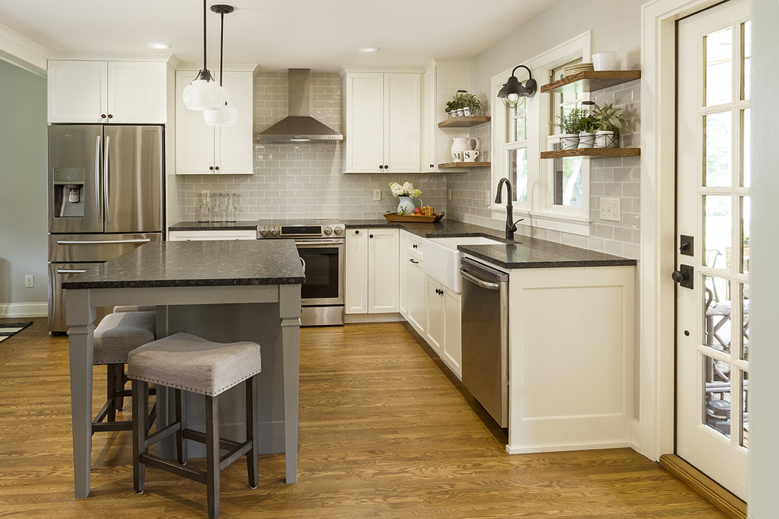 White farmhouse sink in a modern custom kitchen.